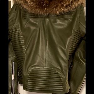 Leather jacket with fur collar